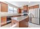 Kitchen with granite countertops and stainless steel appliances at 3365 Sardis Bend Dr, Buford, GA 30519