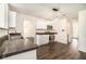 Modern kitchen features stainless steel appliances and dark countertops at 6674 Overlook Rdg, Atlanta, GA 30349