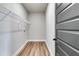 Laundry room with wire shelving and vinyl flooring at 111 Camilla Dr, Carrollton, GA 30116