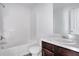 Bathroom with tub, shower, and wood-look floors at 6876 Wildboar Dr, Fairburn, GA 30213