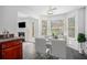 Bright dining area with a bay window, perfect for enjoying meals at 6876 Wildboar Dr, Fairburn, GA 30213