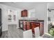 Modern kitchen features dark wood cabinets, updated countertops, and stainless steel appliances at 6876 Wildboar Dr, Fairburn, GA 30213