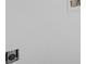 White wall with an electrical outlet at 6876 Wildboar Dr, Fairburn, GA 30213