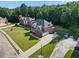 Aerial view of a brick home on a tree-lined street at 3247 Brigadier Way, Stockbridge, GA 30281