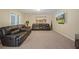 Spacious basement rec room with leather recliners and large TV at 3247 Brigadier Way, Stockbridge, GA 30281
