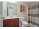 Bathroom with a tub shower, toilet and vanity at 3247 Brigadier Way, Stockbridge, GA 30281