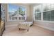 Bedroom with chaise lounge and plenty of natural light at 3247 Brigadier Way, Stockbridge, GA 30281