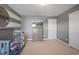 bedroom with gray walls and a crib at 3247 Brigadier Way, Stockbridge, GA 30281