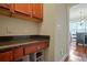 Well-lit kitchen pantry with granite countertop and extra storage at 3247 Brigadier Way, Stockbridge, GA 30281