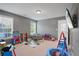 Playroom with toys, a beanbag chair, and a trampoline at 3247 Brigadier Way, Stockbridge, GA 30281