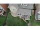 Aerial view of the home with a well-maintained lawn and private backyard area at 4685 Prater Se Way, Smyrna, GA 30080