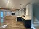 Finished basement with a wet bar, stainless wine cooler, and a spacious seating area with a large TV at 4685 Prater Se Way, Smyrna, GA 30080