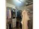 Organized walk-in closet with clothing racks and shelves, maximizing space at 4685 Prater Se Way, Smyrna, GA 30080