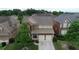 Two-story brick and siding home featuring a manicured front yard and a two-car garage at 4685 Prater Se Way, Smyrna, GA 30080