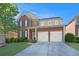 Traditional brick home features a two-car garage, manicured lawn, and covered front entry at 4685 Prater Se Way, Smyrna, GA 30080