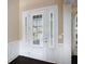 Elegant white front door with sidelights and decorative molding, enhancing curb appeal at 4685 Prater Se Way, Smyrna, GA 30080