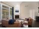 Cozy living room with high ceilings, fireplace, and ample natural light at 4685 Prater Se Way, Smyrna, GA 30080