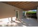 Spacious covered patio with overhead wood and ceiling fan, perfect for outdoor relaxation at 4685 Prater Se Way, Smyrna, GA 30080