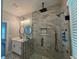 Bathroom featuring double vanities and a large glass-enclosed shower at 556 Paines Nw Ave, Atlanta, GA 30318