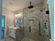 Elegant bathroom with marble shower and double vanity at 556 Paines Nw Ave, Atlanta, GA 30318