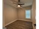 Simple bedroom with ceiling fan and window at 556 Paines Nw Ave, Atlanta, GA 30318