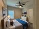 Stylishly staged bedroom showcasing a bed, a window, and elegant decor at 556 Paines Nw Ave, Atlanta, GA 30318