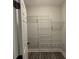 A walk-in closet with adjustable wire shelving for optimal organization at 556 Paines Nw Ave, Atlanta, GA 30318