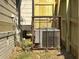 Exterior shot of an air conditioner unit with a protective cage at 556 Paines Nw Ave, Atlanta, GA 30318