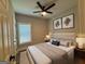Bright main bedroom with modern decor, neutral tones, and a large window providing natural light at 556 Paines Nw Ave, Atlanta, GA 30318