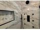 Large marble shower with a rainfall showerhead and multiple jets at 556 Paines Nw Ave, Atlanta, GA 30318