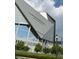 The Mercedes-Benz Stadium features a modern design with glass windows and the name displayed prominently on the side at 556 Paines Nw Ave, Atlanta, GA 30318