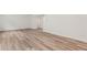 Bright living room features hardwood floors and white walls at 386 Rock View Ln, Covington, GA 30016