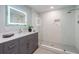 Modern bathroom with a walk-in shower and double vanity at 5490 Conway Dr, Marietta, GA 30068