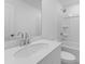 Bright bathroom with a sleek white sink and a shower and tub combination at 3254 Durston Ct, Dacula, GA 30019