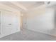 Bright bedroom offers soft carpeting, closet space, and neutral walls at 3254 Durston Ct, Dacula, GA 30019