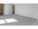 Neutral bedroom showcases gray carpet, white walls, and an open door leading to an ensuite bathroom at 3254 Durston Ct, Dacula, GA 30019