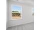 Bright bedroom featuring soft carpeting and natural light from two windows at 3254 Durston Ct, Dacula, GA 30019