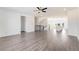 Spacious open-concept living area with a view of the kitchen and staircase at 3254 Durston Ct, Dacula, GA 30019