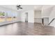 Spacious living room with hardwood floors and view of the staircase to the upper level at 3254 Durston Ct, Dacula, GA 30019