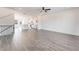 Spacious open-concept living room with adjacent kitchen at 3254 Durston Ct, Dacula, GA 30019