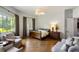 Bright bedroom with hardwood floors and large windows at 4520 Garmon Nw Rd, Atlanta, GA 30327