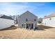 House with covered patio and spacious backyard at 6094 Whitetail Deer Run, Mableton, GA 30126