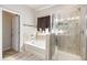 Bathroom with soaking tub, shower, and double vanity at 6094 Whitetail Deer Run, Mableton, GA 30126