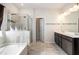Main bathroom with double vanity and large shower at 6094 Whitetail Deer Run, Mableton, GA 30126