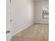 Spacious bedroom with carpeted floors and window at 6094 Whitetail Deer Run, Mableton, GA 30126