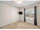 Bedroom with carpeted floors and window at 6094 Whitetail Deer Run, Mableton, GA 30126