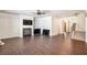 Open living room featuring hardwood floors and a fireplace at 6094 Whitetail Deer Run, Mableton, GA 30126
