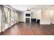 Spacious living room with fireplace and hardwood floors at 6094 Whitetail Deer Run, Mableton, GA 30126