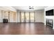 Spacious living room featuring hardwood floors and a fireplace at 6094 Whitetail Deer Run, Mableton, GA 30126