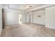 Large main bedroom with carpeted floors and ceiling fan at 6094 Whitetail Deer Run, Mableton, GA 30126